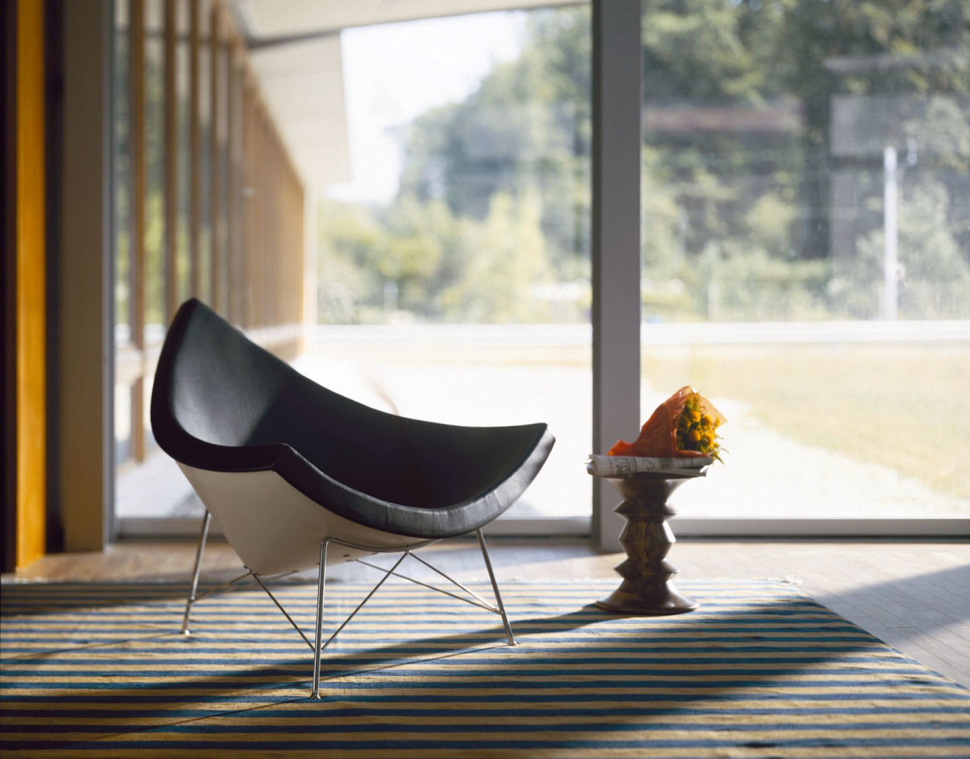 Coconut Chair in a Modern Interior Setting - Mid-Century Modern Trend